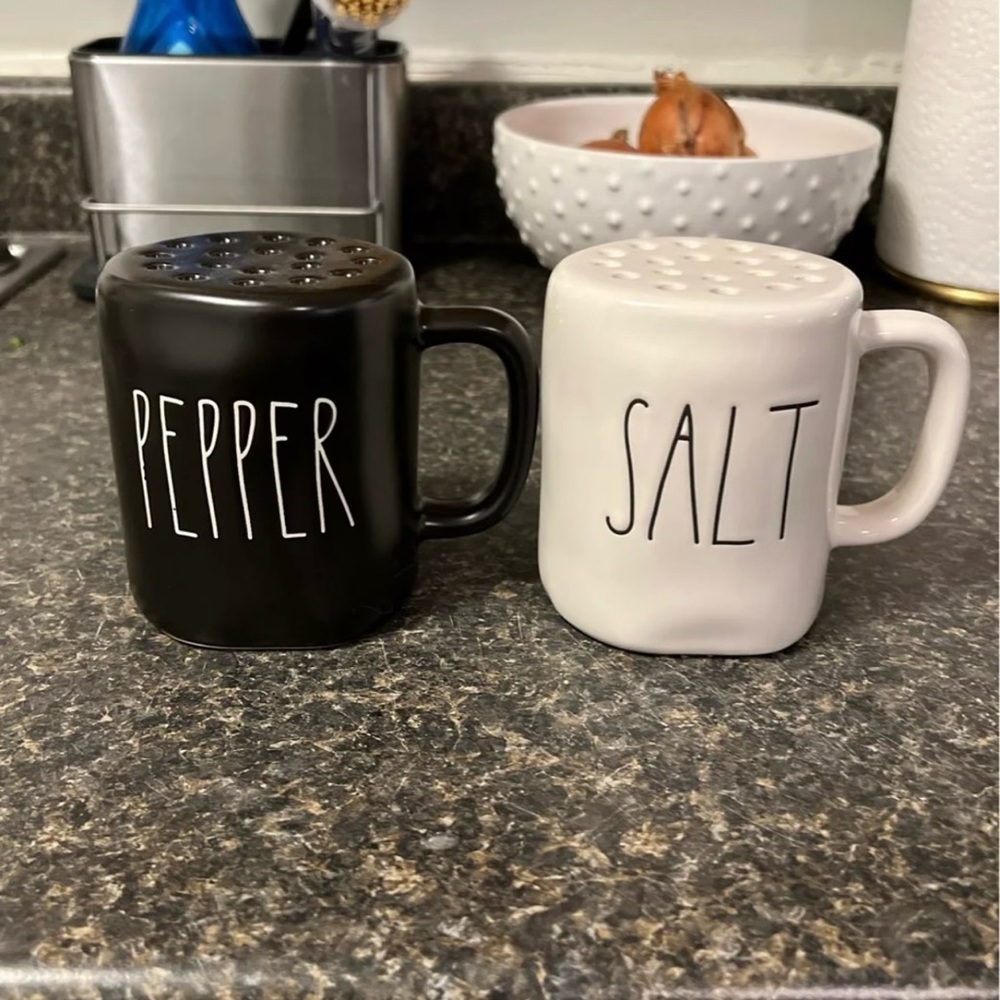 brand new, never used, large black and white Rae Dunn salt and pepper shakers.